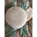"Round cushion with smock"